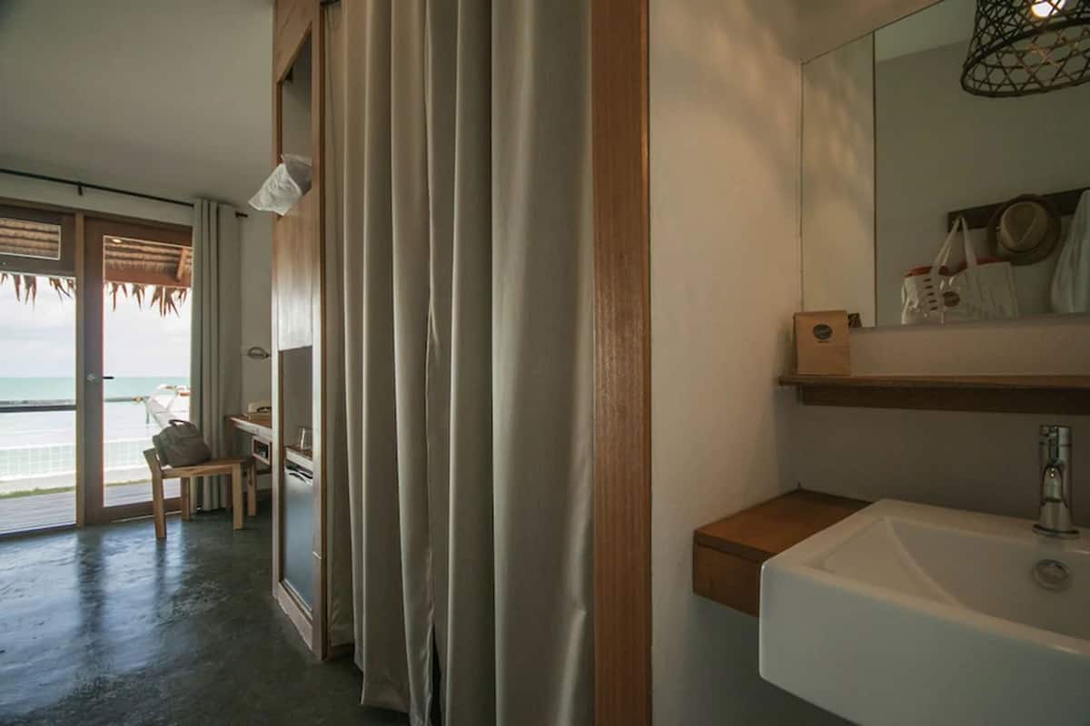 honeymoon bungalow, beachfront | bathroom sink