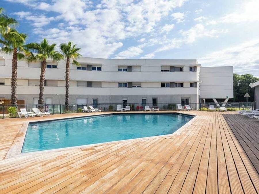 Seasonal outdoor pool, open 10:00 AM to 7:00 PM, pool loungers