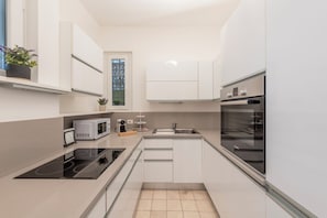 Suite Michelangelo 2 ( Via Boccaccio 27 ) | Private kitchen | Fridge, microwave, espresso maker, coffee/tea maker