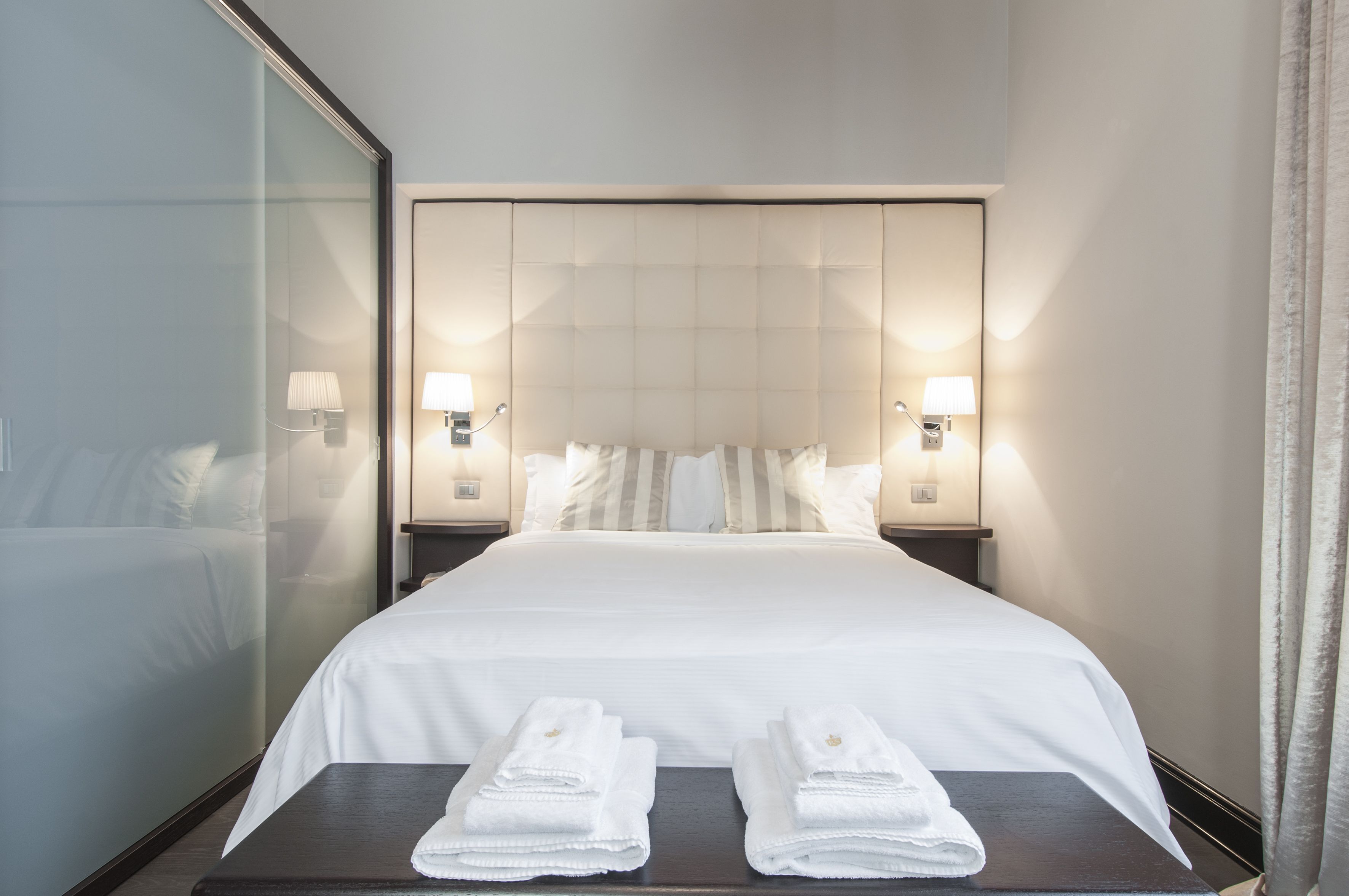 Premium bedding, down comforters, minibar, in-room safe