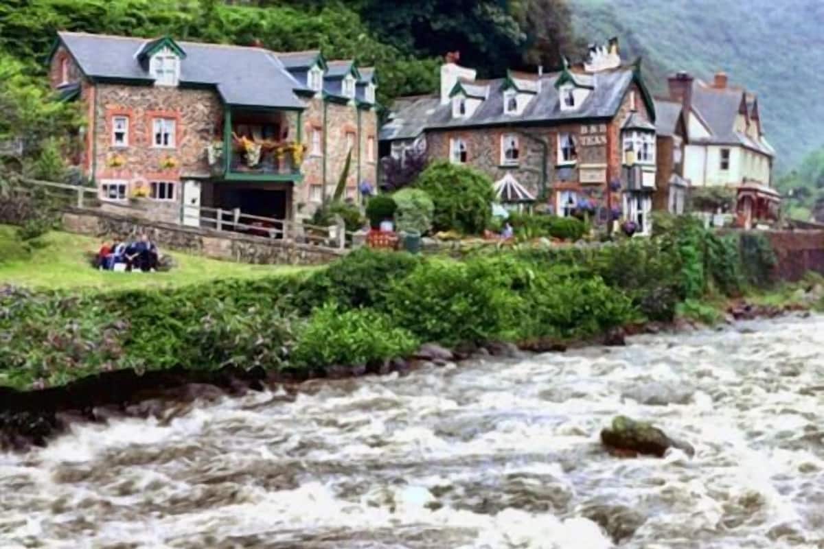 A riverside hotel with stone facades and traditional architecture.