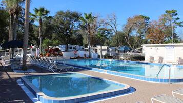 Outdoor pool, pool umbrellas, sun loungers