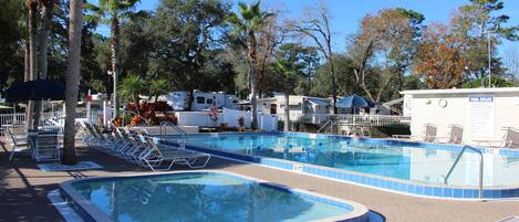 Outdoor pool, pool umbrellas, sun loungers