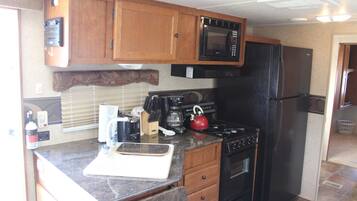 RV | Private kitchen | Fridge, microwave, stovetop, coffee/tea maker