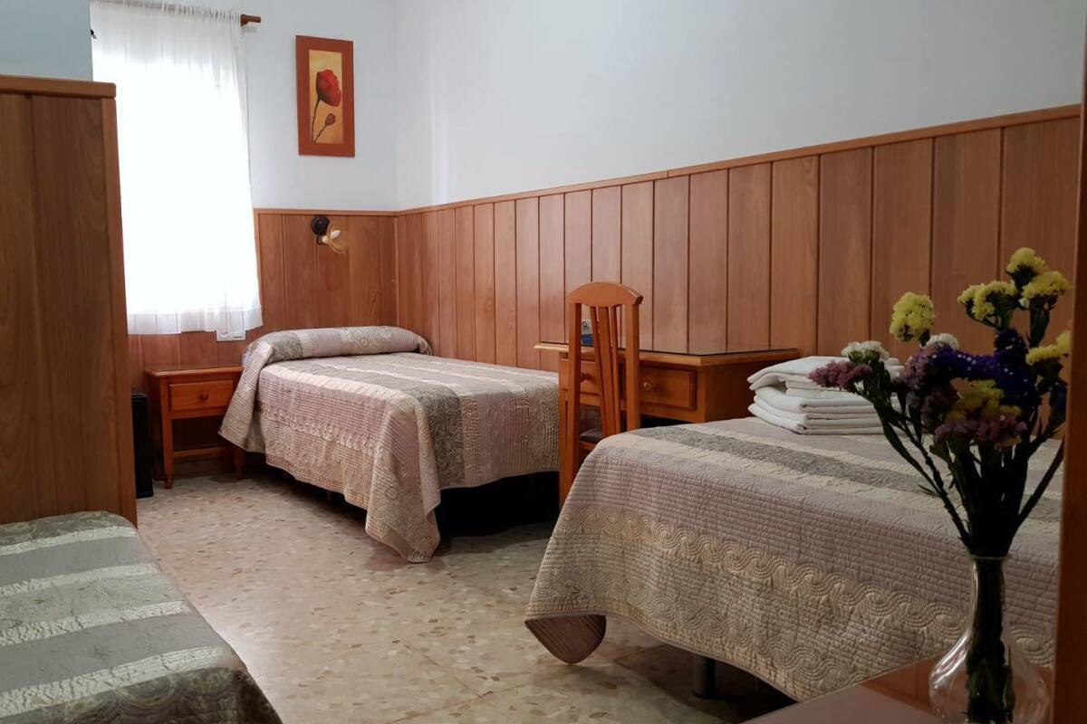 Triple Room | Memory foam beds, minibar, iron/ironing board (on request), cribs (free)