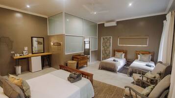 Family Room, Garden View | 1 bedroom, in-room safe, individually decorated, individually furnished