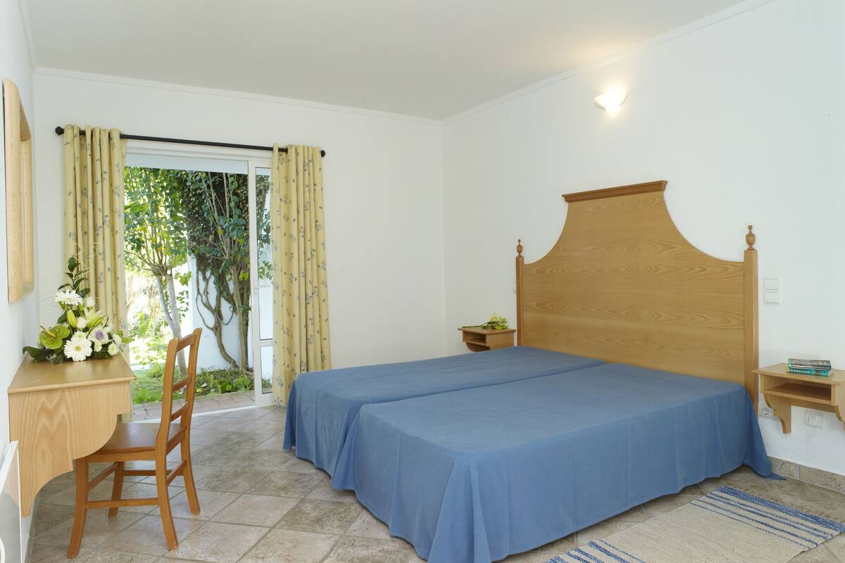 Apartment, 1 Bedroom | In-room safe, blackout drapes, iron/ironing board, cribs/infant beds