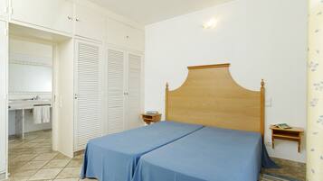 In-room safe, blackout curtains, iron/ironing board, cots/infant beds