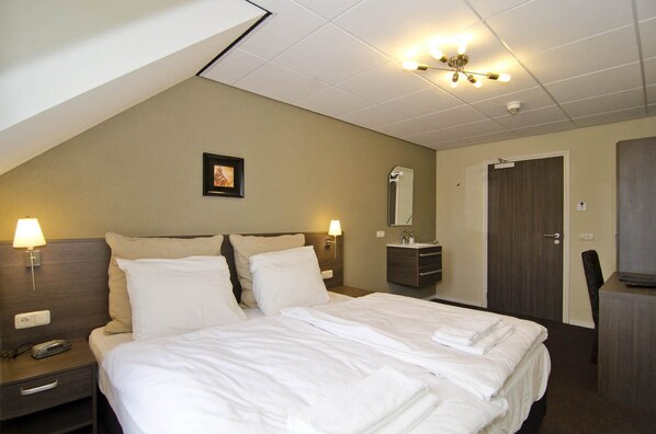 Desk, free WiFi, bed sheets