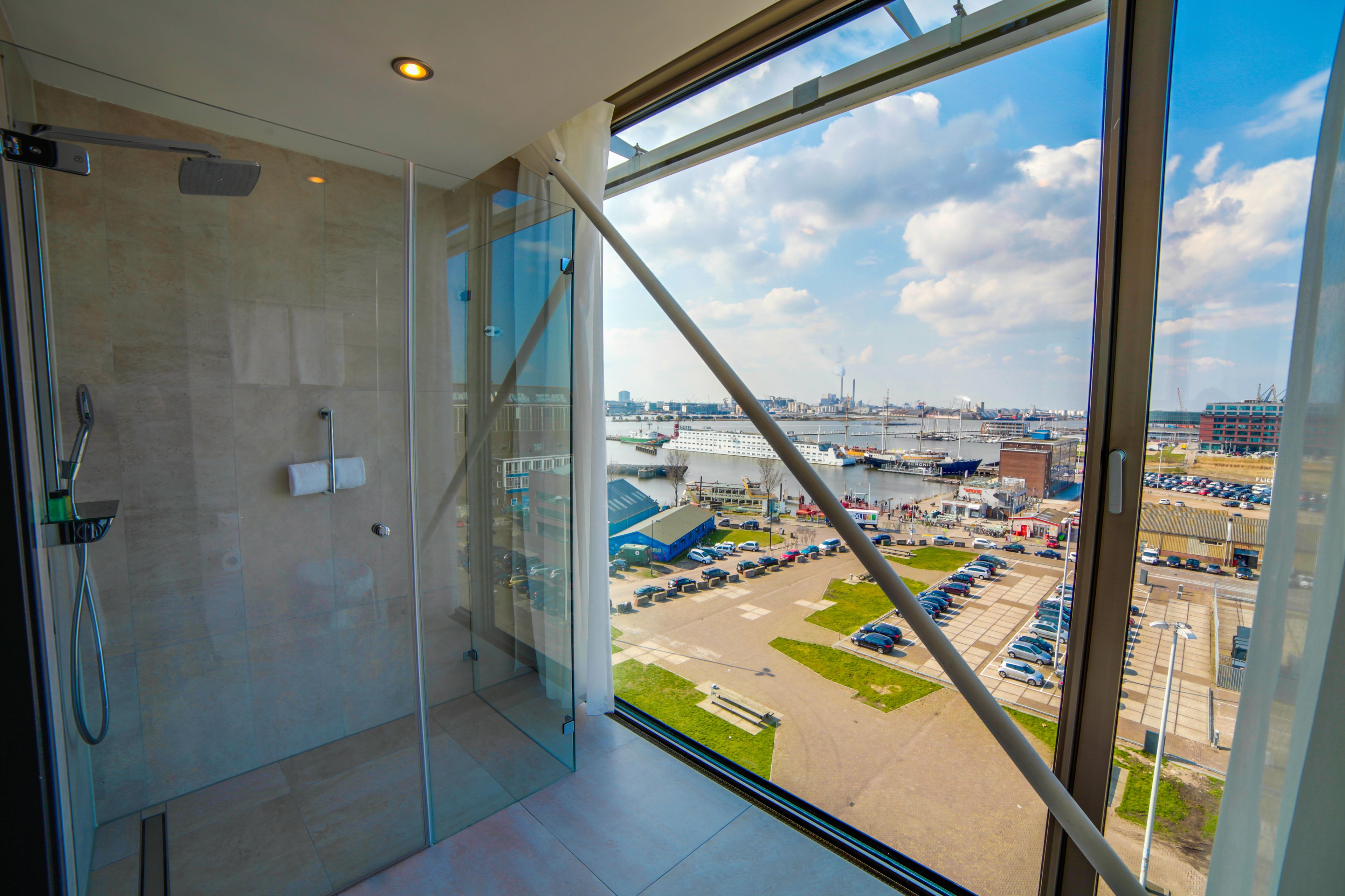 rainfall showerhead, eco-friendly toiletries, bathrobes, slippers