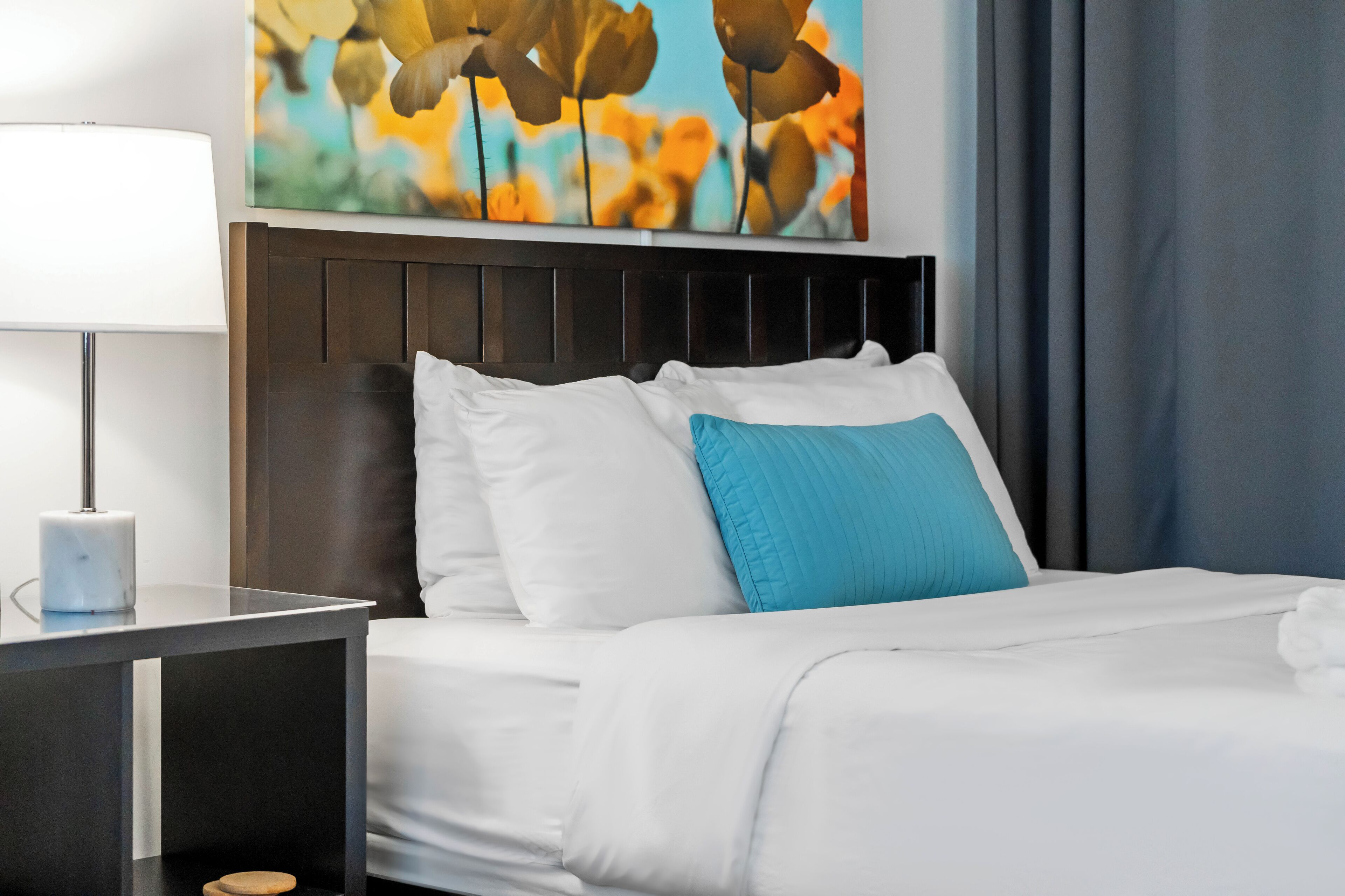 Premium bedding, laptop workspace, blackout curtains, iron/ironing board