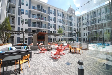 Premium bedding, laptop workspace, blackout curtains, iron/ironing board. BCA Furnished Apartments