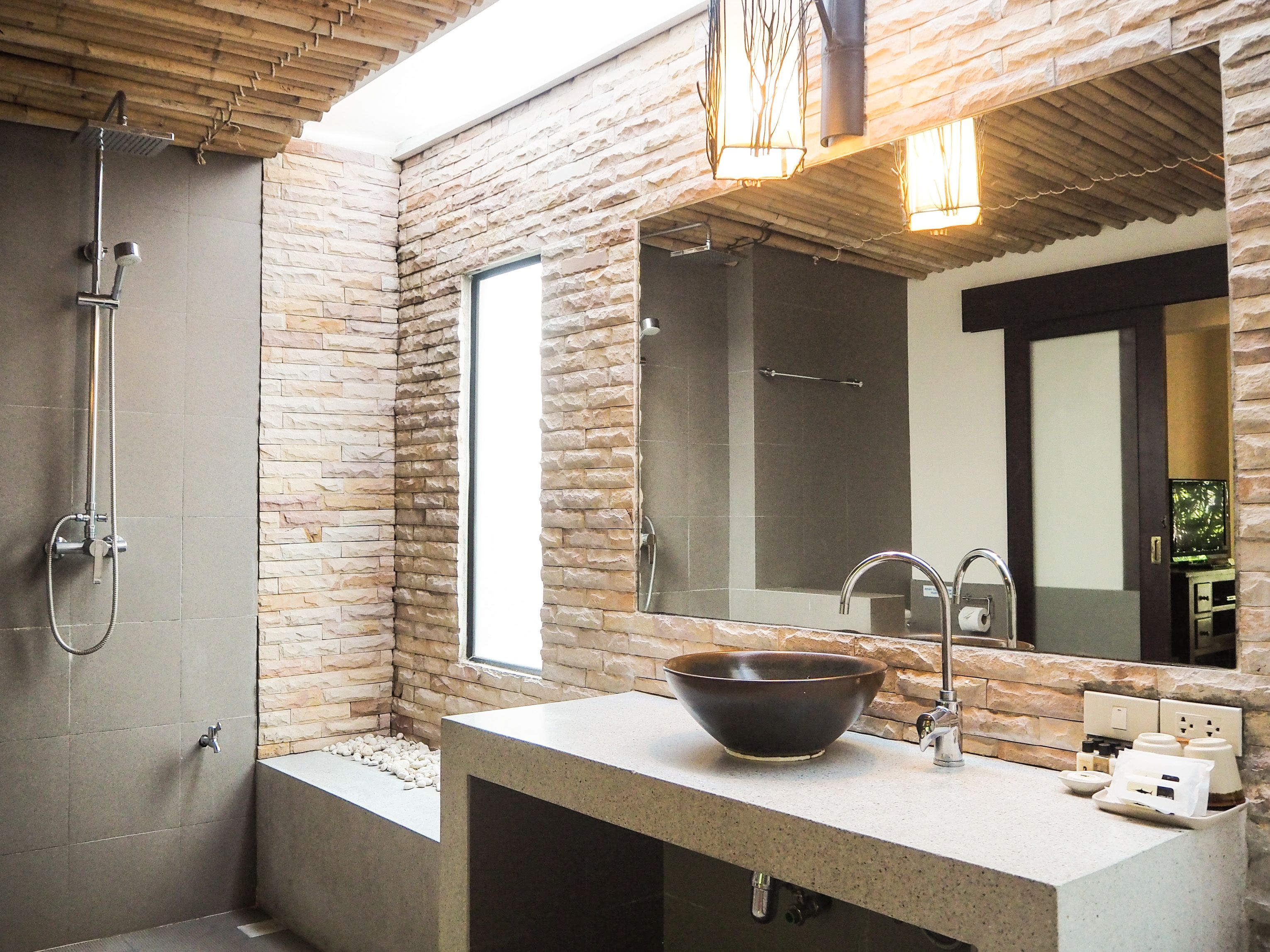 deluxe room, 1 king bed | bathroom | free toiletries, hair dryer, bidet, towels