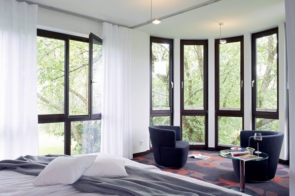 Junior Suite | Sengetøy av topp kvalitet, safe på rommet og individuelt dekorert