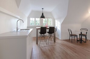 Apartamento | Área de estar | TV 40 polegadas com canais a cabo