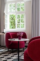 Junior Suite | Living area | 40-inch TV with cable channels