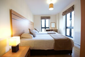 Coffres-forts dans les chambres, fer et planche à repasser