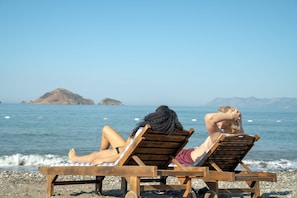 Private beach, sun loungers, beach umbrellas, beach towels