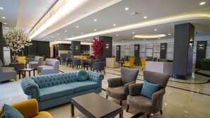 Coin salon dans le hall