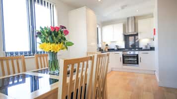 Apartment, 2 Bedrooms | Private kitchen | Fridge, microwave, dishwasher, coffee/tea maker