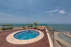 Outdoor pool, open 7:30 AM to 8:00 PM, pool loungers, lifeguards on site