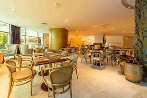 3 bars/lounges, poolside bar, beach bar
