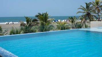 Outdoor pool, open 7:30 AM to 8:00 PM, sun loungers, lifeguards on site
