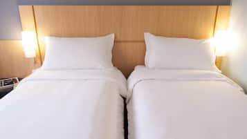 Minibar, blackout curtains, soundproofing, iron/ironing board