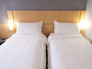 Minibar, blackout curtains, soundproofing, iron/ironing board