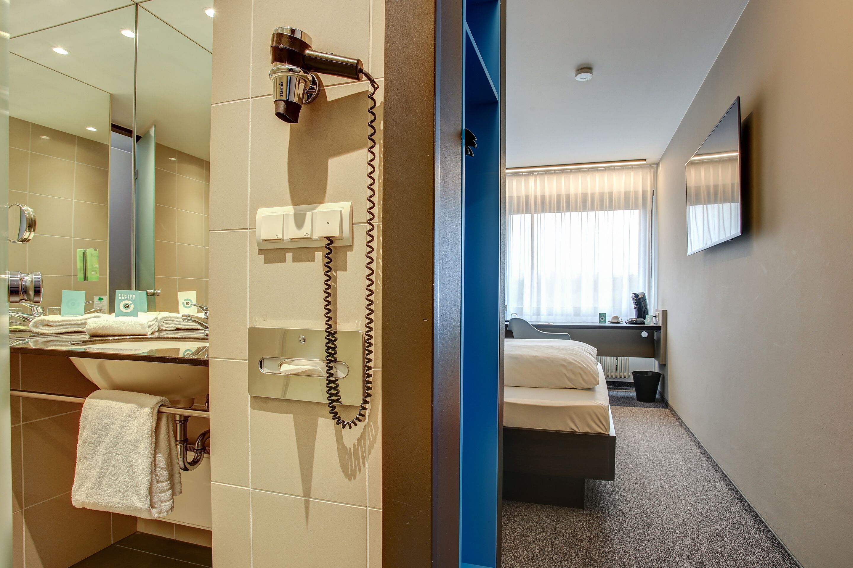 standard single room | living area | 49-inch flat-screen tv with satellite channels, tv