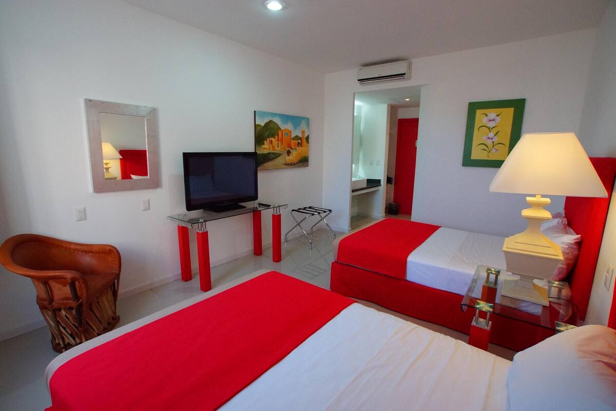 In-room safe, desk, WiFi (free), bed sheets
