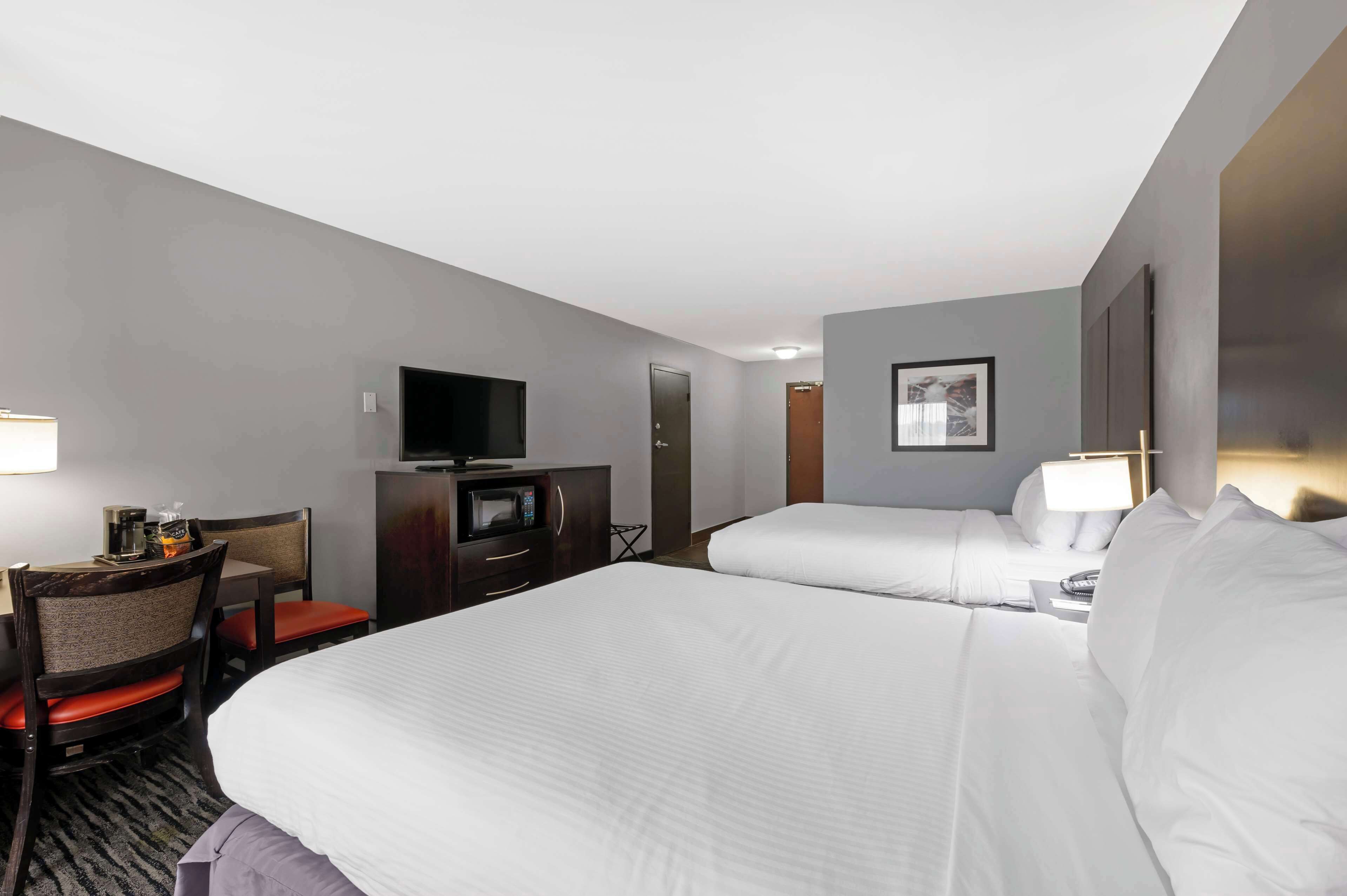 desk, laptop workspace, blackout curtains, iron/ironing board