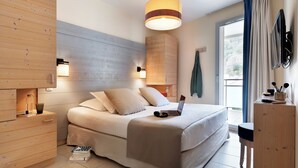 Appartement 4 personnes - 1 chambre - Climatisé | Safe på rommet, barnesenger (inkludert), wi-fi (inkludert) og sengetøy