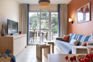 Lägenhet - 2 sovrum | Vardagsrum | Platt-tv