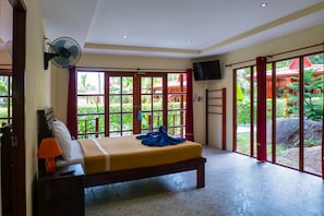 Family Bungalow | Minibar, in-room safe, desk, iron/ironing board