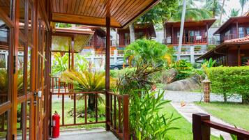 Deluxe Room, Beachfront | Terrace/patio