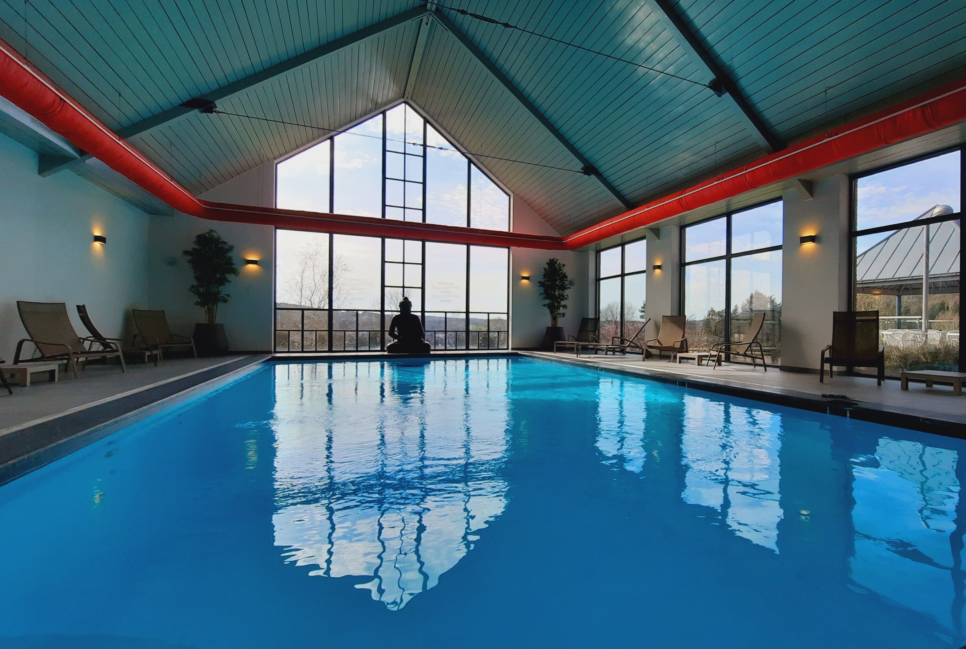 indoor pool, open 8:00 am to 10:00 pm, pool loungers