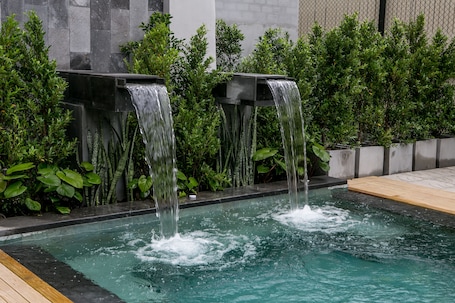 Outdoor pool, pool umbrellas, sun loungers