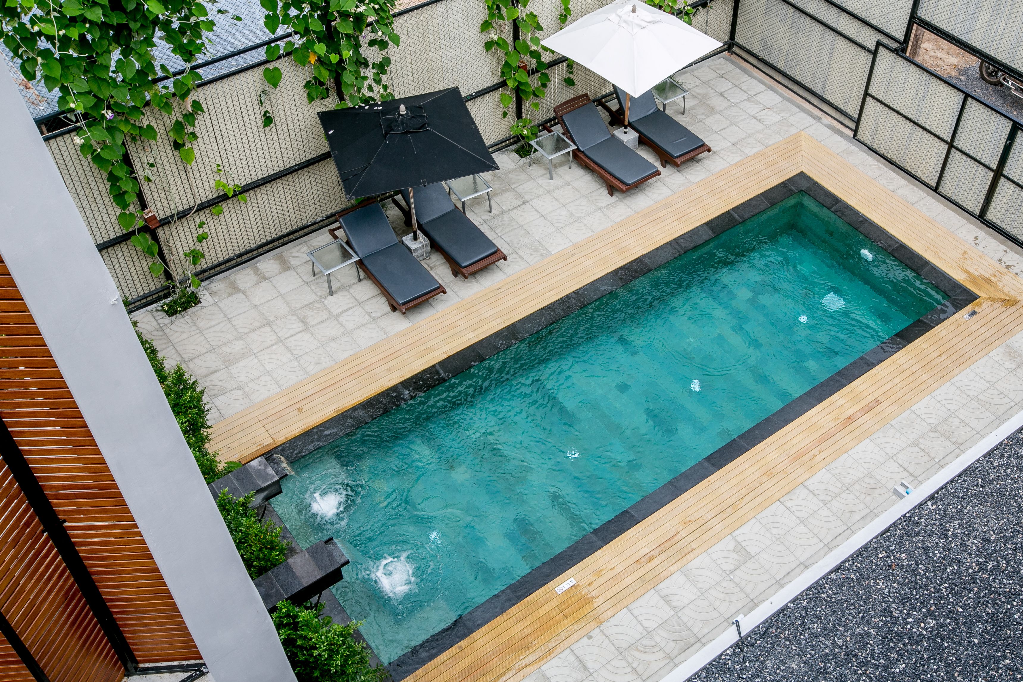 Outdoor pool, pool umbrellas, pool loungers