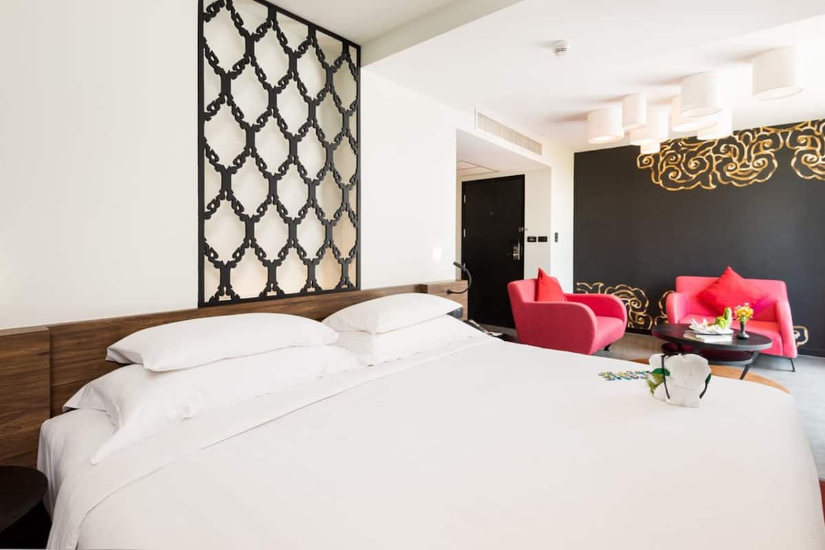 Habitación junior | Ropa de cama de alta calidad y artículos del minibar gratis