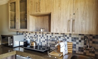 Quarto casal | Cozinha privada | Geladeira, micro-ondas, cafeteira/chaleira