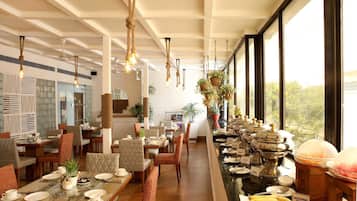 Breakfast, lunch, dinner served; international cuisine