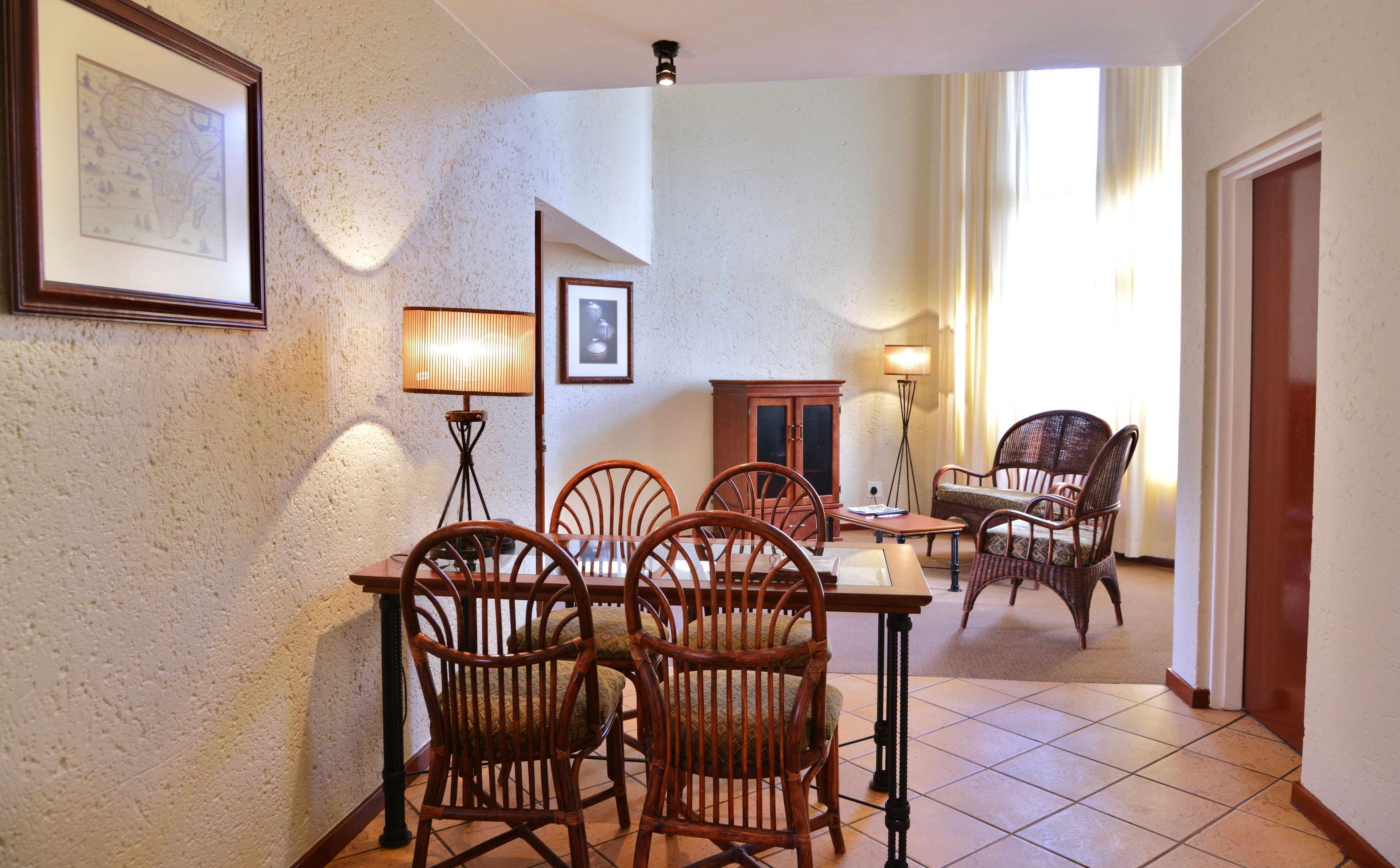 suite | living area | flat-screen tv