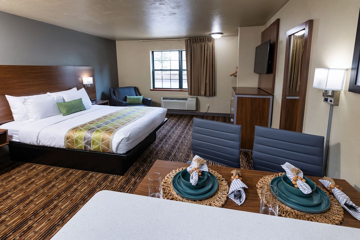 Executive Suite, 1 Queen Bed | 1 bedroom, pillowtop beds, individually decorated