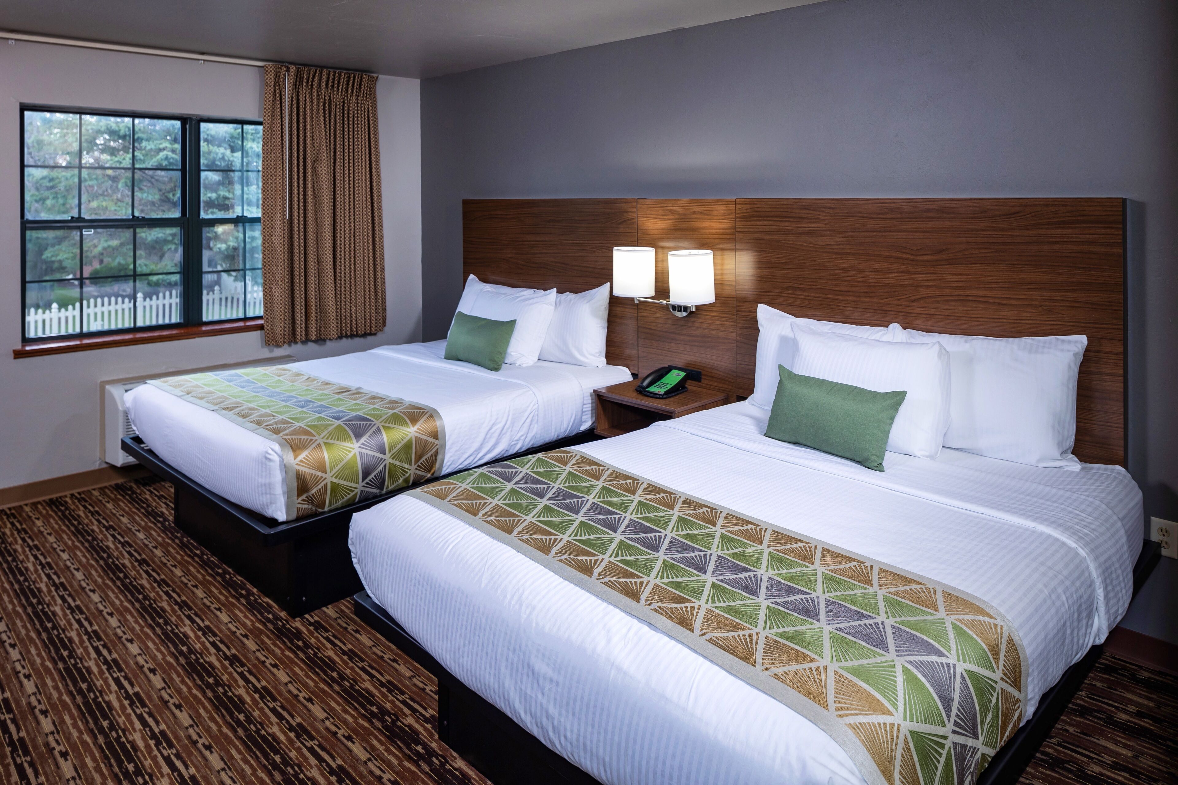 Executive Suite, 2 Bedrooms | Pillow-top beds, individually decorated, individually furnished, desk