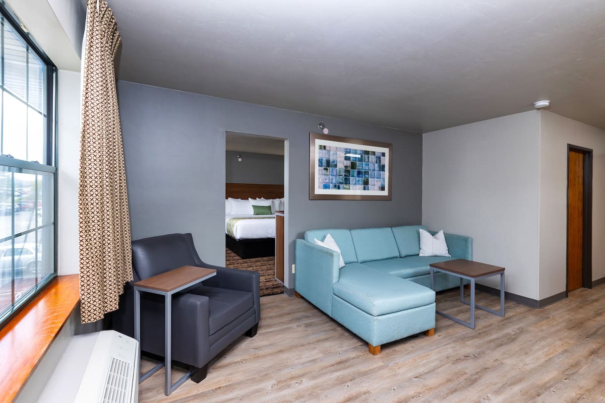 Executive 2 Room Suite, 1 King Bed | Living area | 32-inch LED TV with cable channels, TV