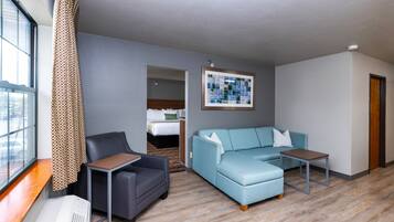 Executive 2 Room Suite, 1 King Bed | Living area | 32-inch LED TV with cable channels, TV