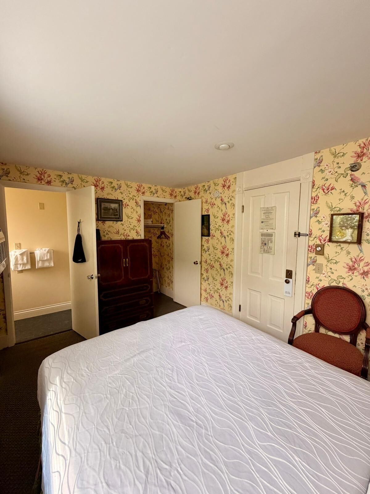 historic room, one queen bed patio view | individually decorated, individually furnished, iron/ironing board