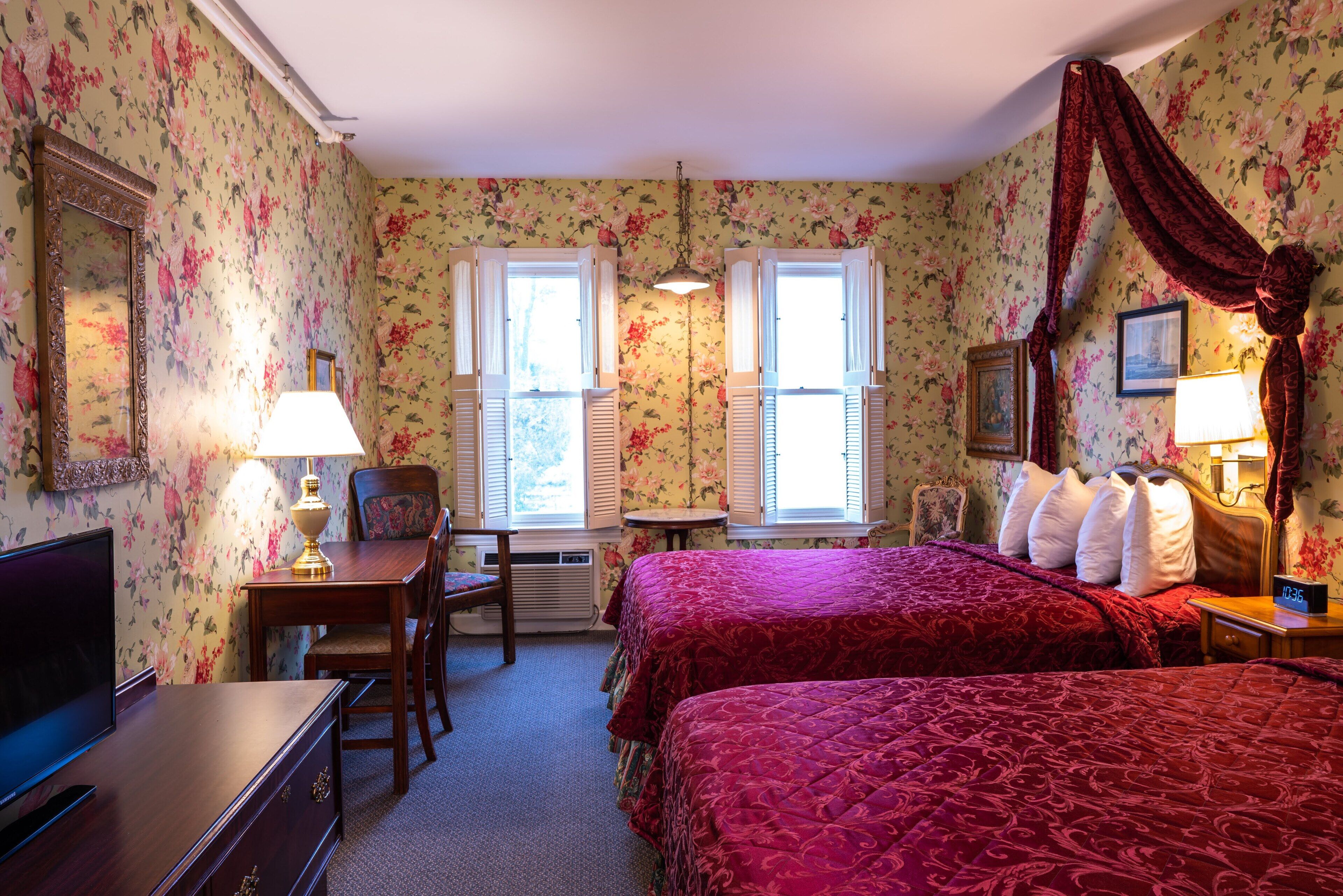 deluxe room, 2 queen beds (standard view) | individually decorated, individually furnished, iron/ironing board