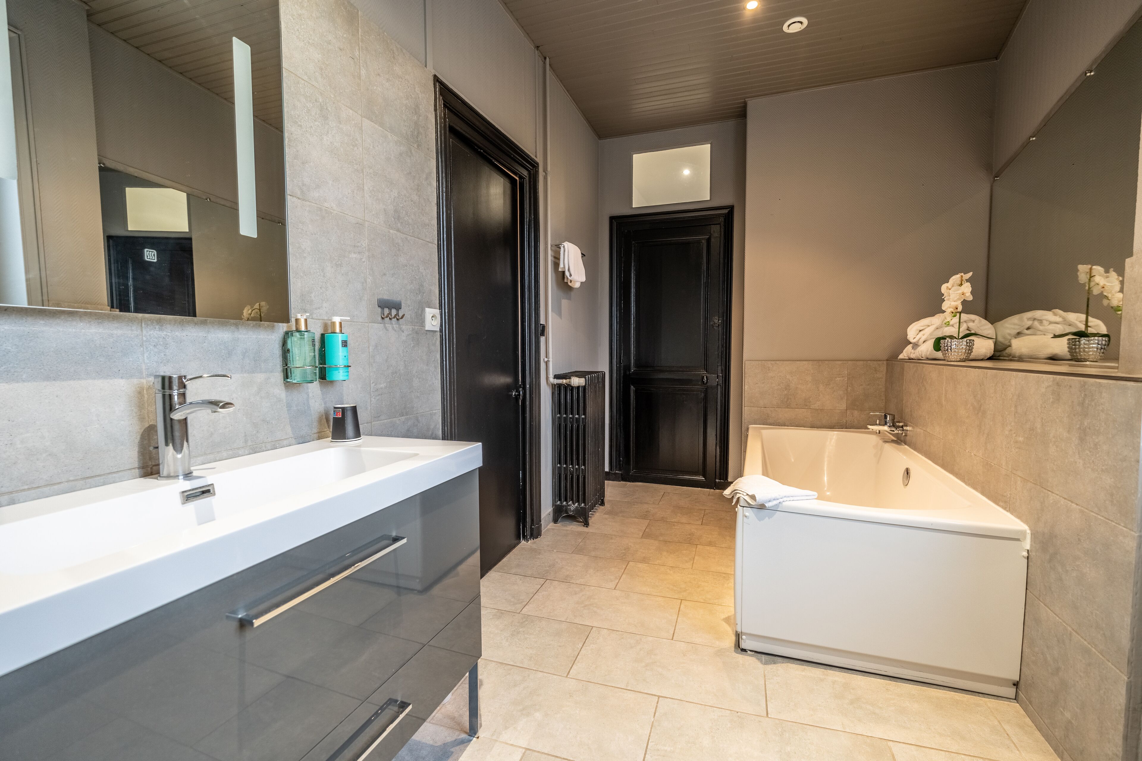 quadruple suite garden view | bathroom | free toiletries, hair dryer, towels
